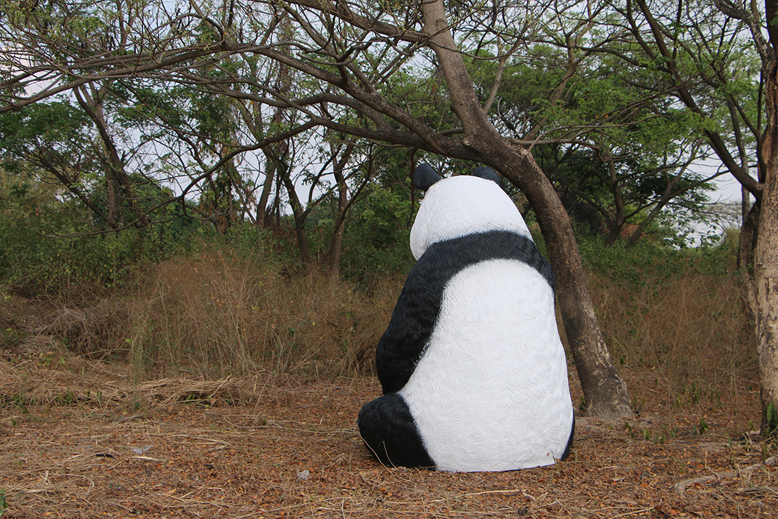 Giant Sitting Panda Bear Eating Fiberglass Statue