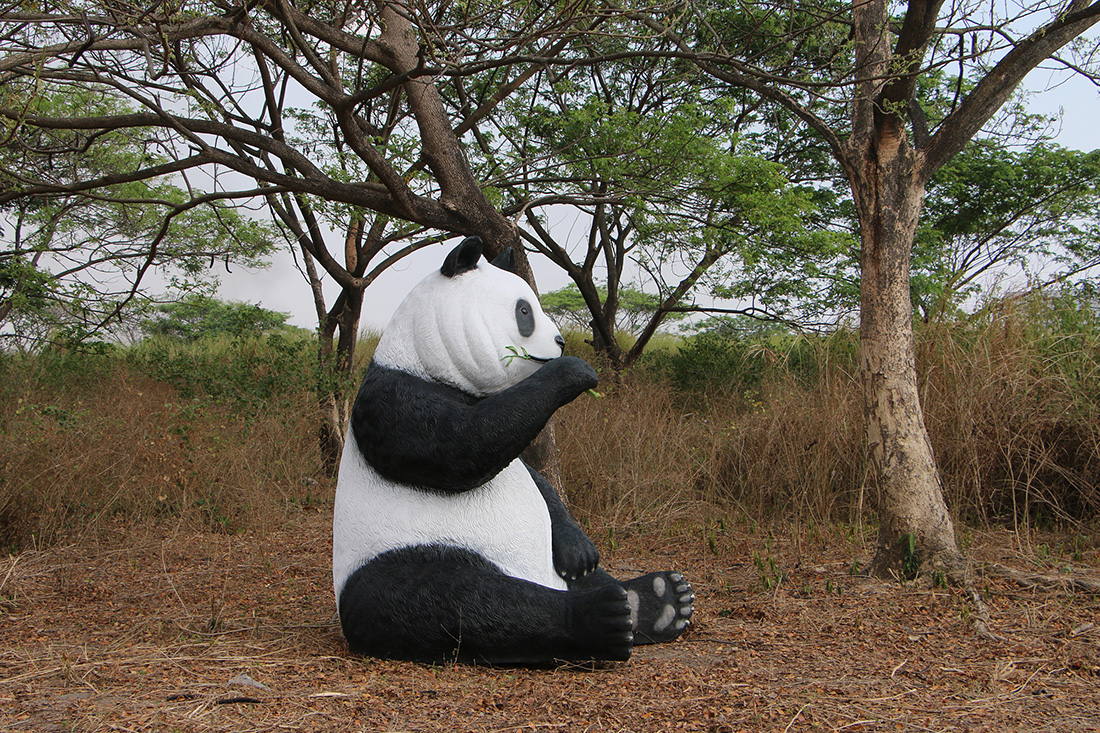 Giant Sitting Panda Bear Eating Fiberglass Statue