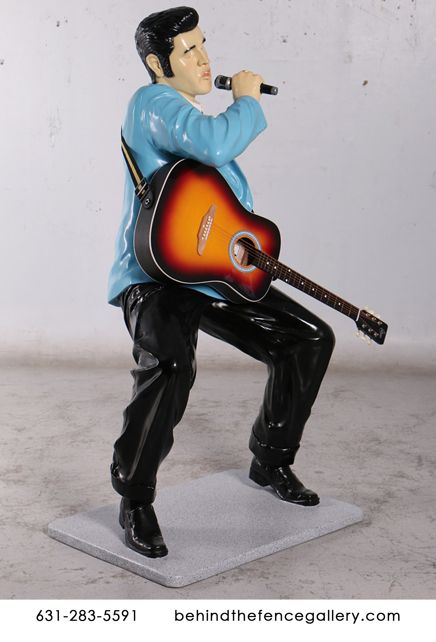 Elvis Singing With Guitar Statue