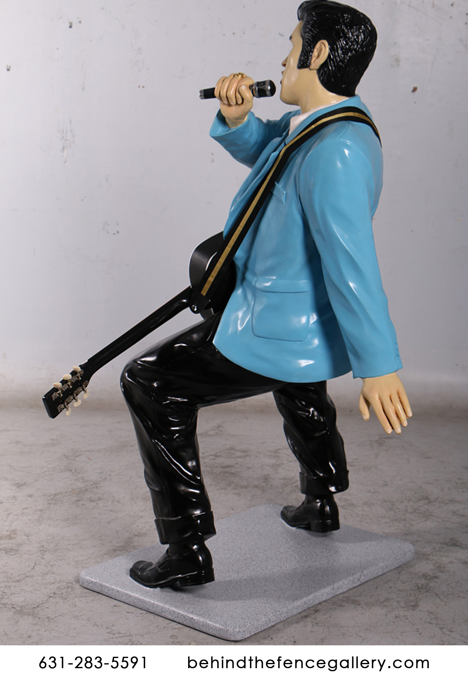 Elvis Singing With Guitar Statue