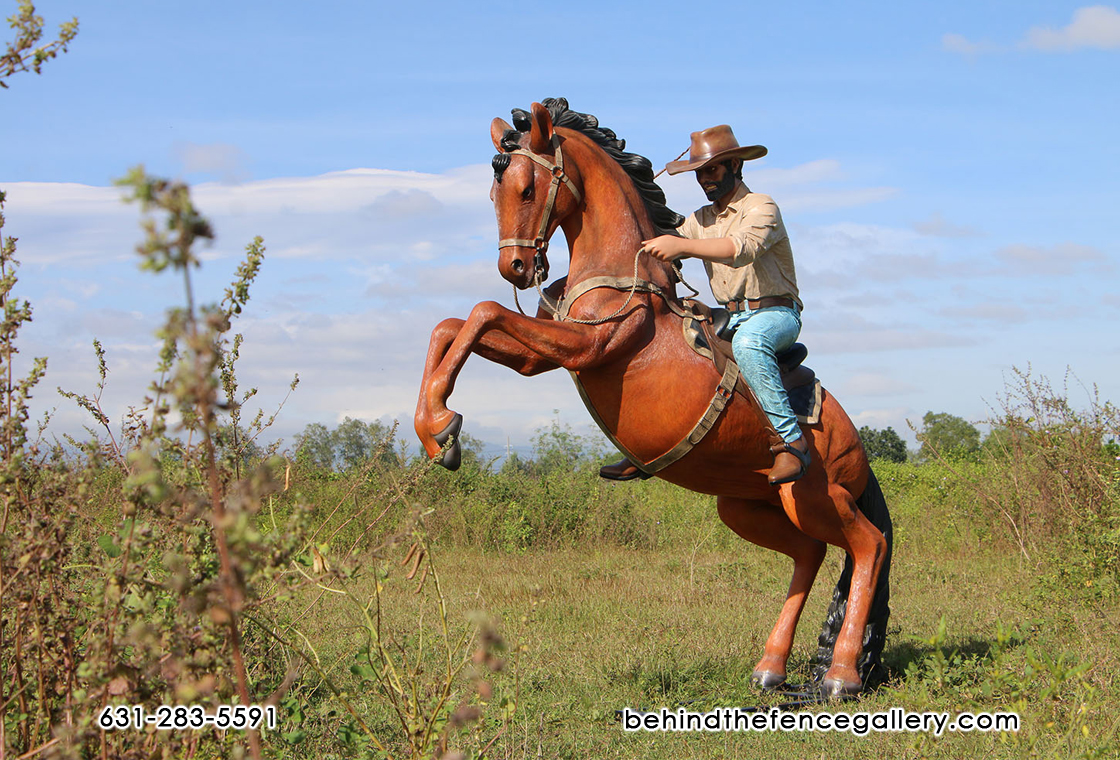 (image for) Cowboy Riding Stallion Statue