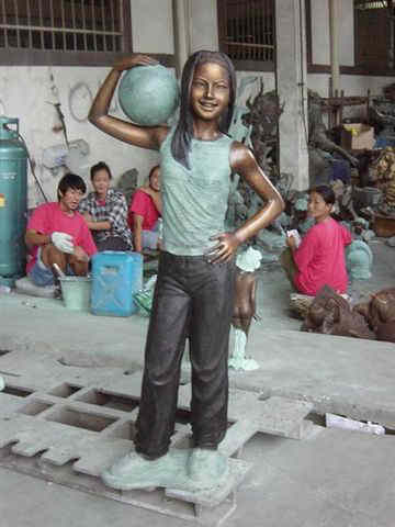 Bronze Girl Playing Soccer