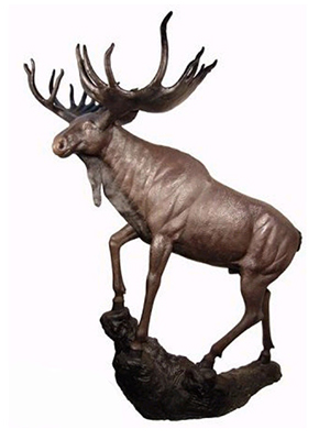 Bronze Moose standing on a Rock