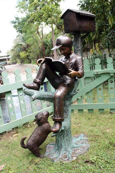 Sitting Boy with Mailbox