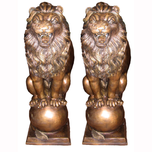 Bronze Lion's on Ball